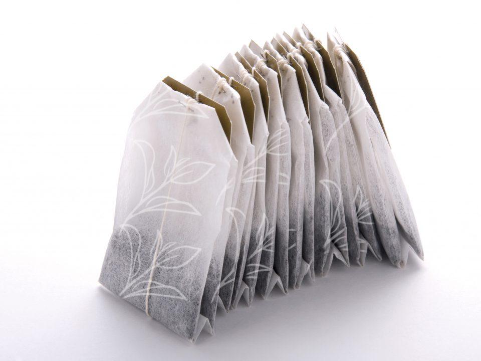 tea bags on a white surface